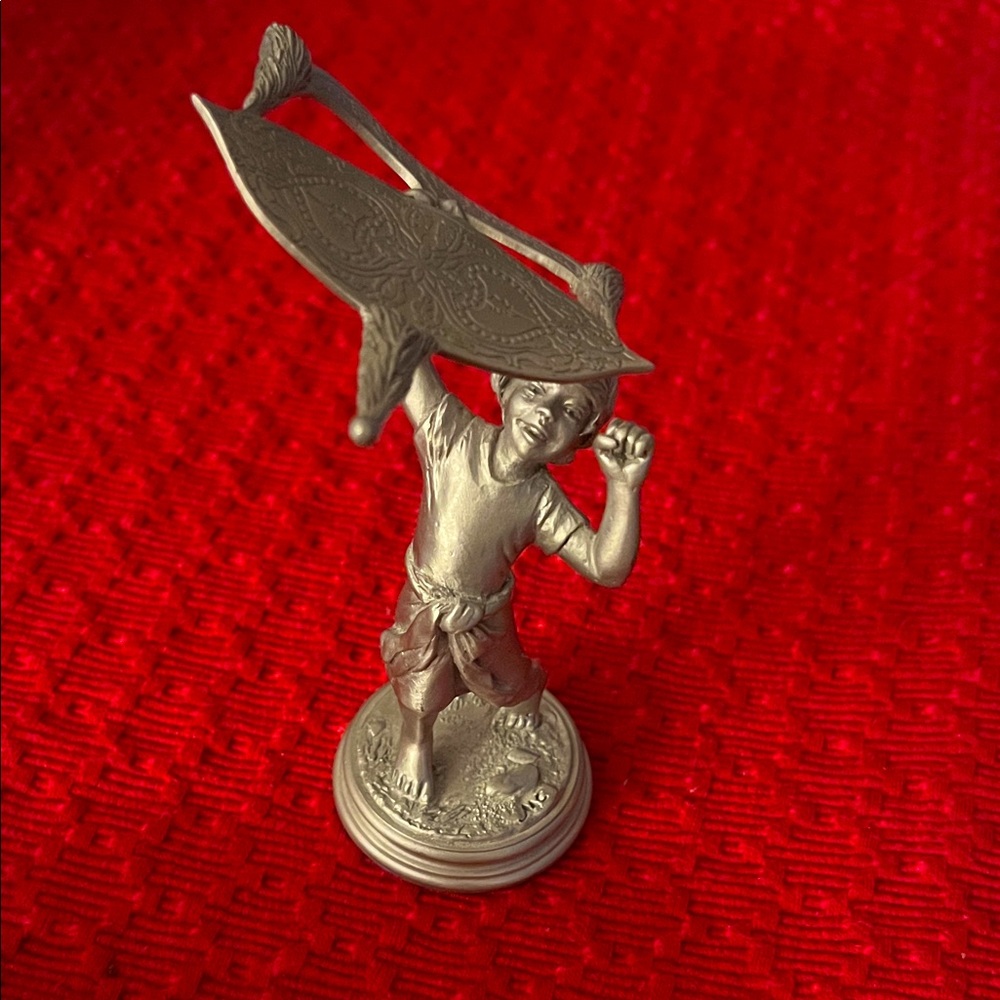 1985, Wau Bulan, Tumasek Pewter “boy flying kite” figurine.